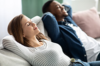 Couple relaxing after Sea Girt furnace repair